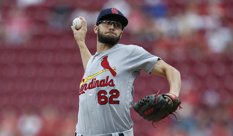 St. Louis Cardinals starting pitcher Daniel Poncedeleon (62) throws against the Cincinnati Reds during the first inning of a baseball game, Monday, July 23, 2018, in Cincinnati. (AP Photo/Gary Landers)