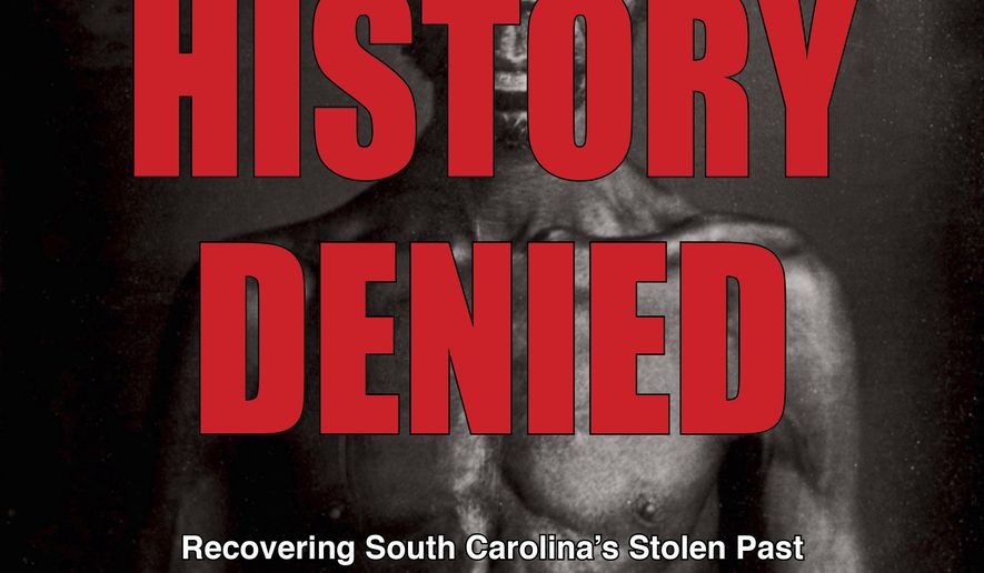 The cover of the "History Denied: Recovering South Carolina's Stolen Past", is seen with a photo of Renty, one of the earliest photographs of an enslaved person. The 48- page magazine was published by the South Carolina Progressive Network in Columbia, S.C. The social justice group in South Carolina wants to bring more attention to a gathering of African-American and white college students who sat together and called for equality just a year after World War II. (South Carolina Progressive Network via AP)