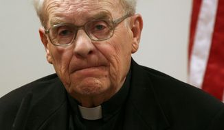 FILE - In this May 18, 2009 file photo, former Seattle Archbishop Raymond Hunthausen, 87, retired and living in Montana, testifies at the King County Courthouse in Seattle. Former Seattle Archbishop Raymond G. Hunthausen has died at 96. The Roman Catholic archdiocese says Hunthausen died Sunday, July 22, 2018, at his home in Helena, Montana. Hunthausen served as the bishop of Helena from 1962 to 1975 and as archbishop of Seattle from 1975 to 1991. (Ellen Banner/The Seattle Times via AP, File)