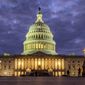 In this Jan. 21, 2018, file photo, lights shine inside the U.S. Capitol Building as night falls in Washington. (AP Photo/J. David Ake) ** FILE **
