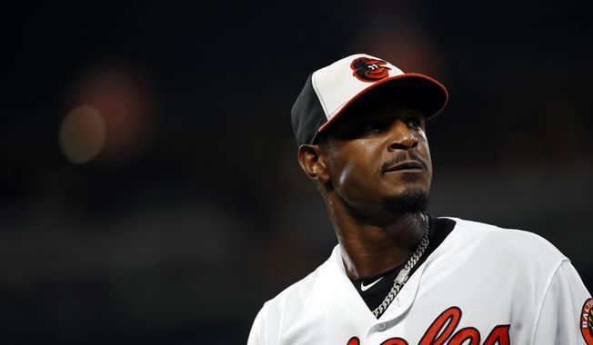 Baltimore Orioles center fielder Adam Jones walks on the field between innings of a baseball game against the Boston Red Sox, Monday, July 23, 2018, in Baltimore. (AP Photo/Patrick Semansky) **FILE**