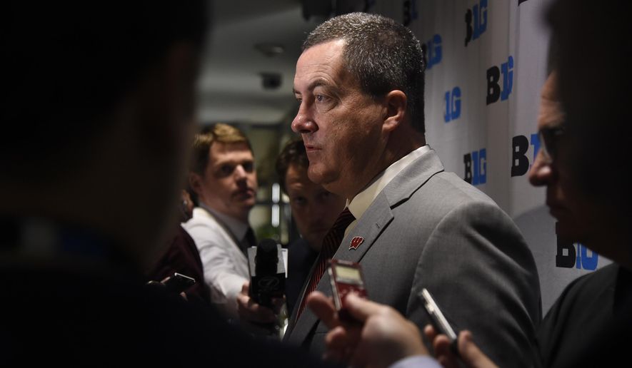 Wisconsin head coach Paul Chryst speaks at the Big Ten Conference NCAA college football Media Days in Chicago, Tuesday, July 24, 2018. (AP Photo/Annie Rice)