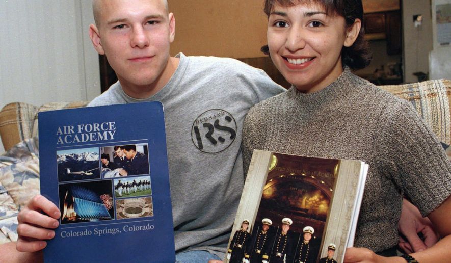 FILE - In this June 1996 file photo, David Graham and fiance Diane Zamora are shown in Fort Worth, Texas after having received appointments to the U.S. Air Force Academy and Naval Academy, respectively. Zamora, a female former Naval Academy midshipman, is currently serving a life sentence for the 1995 slaying of the high school girlfriend of Graham, who was also convicted of murder in the teenage love triangle. The 5th U.S. Circuit Court of Appeals on Monday, July 23, 2018, rejected an appeal by Zamora after a lower court refused her civil rights lawsuit against Texas prison officials. (Robert J. Ruiz/Star-Telegram via AP, File)