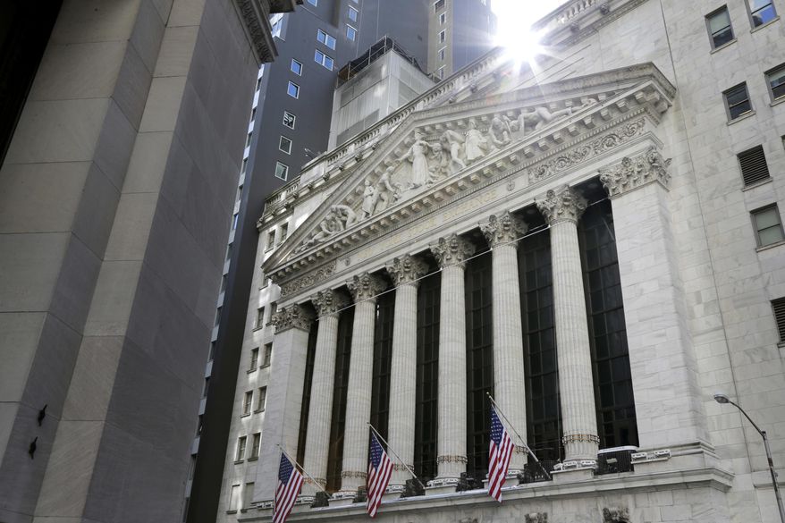 FILE - This June 25, 2018, file photo shows the New York Stock Exchange in New York. Stocks are opening broadly higher on Wall Street as investors were pleased to see strong earnings reports from a number of U.S. companies. (AP Photo/Seth Wenig, File)