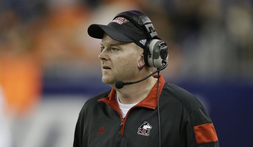 This Dec. 5, 2014 photo shows Northern Illinois head coach Rod Carey watching from the sidelines during the first half of the Mid-American Conference championship NCAA college football game against Bowling Green in Detroit. Ohio and Northern Illinois were tabbed by voters as divisional favorites in the Mid-American Conference preseason poll. The MAC held its football media day Tuesday, July 24, 2018 at Ford Field in Detroit, which is also the site of the Nov. 30 conference championship game. (AP Photo/Carlos Osorio)