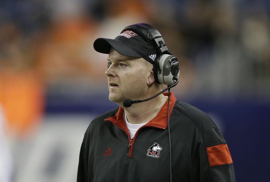 This Dec. 5, 2014 photo shows Northern Illinois head coach Rod Carey watching from the sidelines during the first half of the Mid-American Conference championship NCAA college football game against Bowling Green in Detroit. Ohio and Northern Illinois were tabbed by voters as divisional favorites in the Mid-American Conference preseason poll. The MAC held its football media day Tuesday, July 24, 2018 at Ford Field in Detroit, which is also the site of the Nov. 30 conference championship game. (AP Photo/Carlos Osorio)