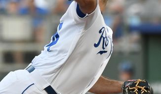 Kansas City Royals starting pitcher Burch Smith throws during the first inning against the Detroit Tigers in a baseball game Tuesday, July 24, 2018, in Kansas City, Mo. (AP Photo/Ed Zurga)