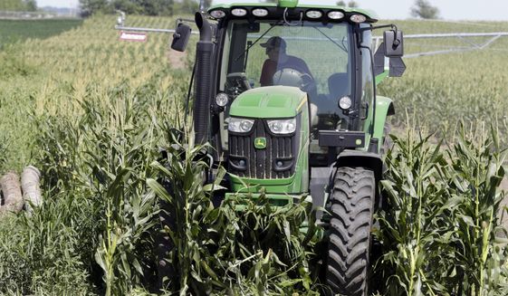 The Agriculture Department predicts a 10 percent uptick from last year in farm profit to $69.4 billion, according to the agency&#39;s first forecast for 2019. (Associated Press/File)