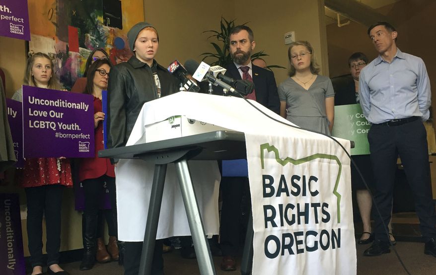 Elliot Yoder, 16, a transgender student at Dallas High School in Dallas, Ore., speaks at a news conference held by ACLU Oregon and Basic Rights in Portland, Ore., to protest a federal lawsuit filed against the Dallas School District over its policy on the treatment of transgender students, in this Nov. 16, 2017, photo. (AP Photo/Gillian Flaccus) **FILE**