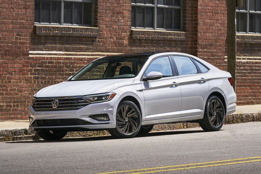 This undated photo provided by Volkswagen shows the 2019 Volkswagen Jetta. While automakers still offer inexpensive utilitarian trim levels of small cars, they are increasingly creating high-end, luxury-like versions as well. With its newly redesigned Jetta, for example, Volkswagen is betting that a surprising range of gadgets and features will get buyers into the showroom. (Courtesy of Volkswagen via AP)