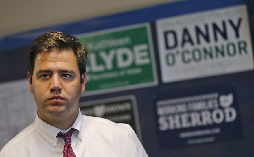 FILE – In this Thursday, July 19, 2018, file photo, Danny O'Connor, a Democrat serving as recorder of Franklin County, Ohio, listens as Boston Mayor Marty Walsh speaks to O'Connor's campaign supporters at the Democrat Party office in Delaware, Ohio. O'Connor and Ohio state Sen. Troy Balderson, R-Zanesville, are running in a special congressional election on Tuesday, Aug. 7, 2018, to determine who will fill out the final months of the term of former U.S. Rep. Pat Tiberi, a Republican who retired in January 2018, before both candidates face off again for the retired lawmaker's seat in the Tuesday, Nov. 6, 2018, general election. (Jonathan Quilter/The Columbus Dispatch via AP, File)