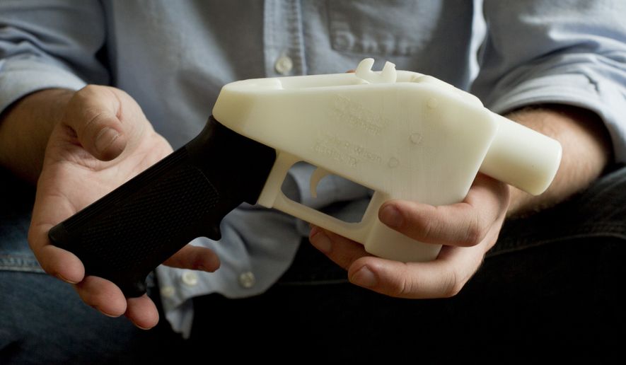 This May 10, 2013, file photo shows a plastic pistol that was completely made on a 3D-printer at a home in Austin, Texas. A coalition of gun-control groups has filed an appeal in federal court seeking to block a recent Trump administration ruling that will allow the publication of blueprints to build a 3D-printed firearm. (Jay Janner/Austin American-Statesman via AP, File)