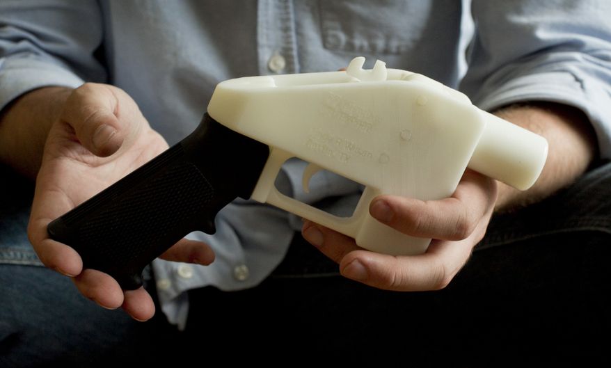 This May 10, 2013, file photo shows a plastic pistol that was completely made on a 3D-printer at a home in Austin, Texas. A coalition of gun-control groups has filed an appeal in federal court seeking to block a recent Trump administration ruling that will allow the publication of blueprints to build a 3D-printed firearm. (Jay Janner/Austin American-Statesman via AP, File)