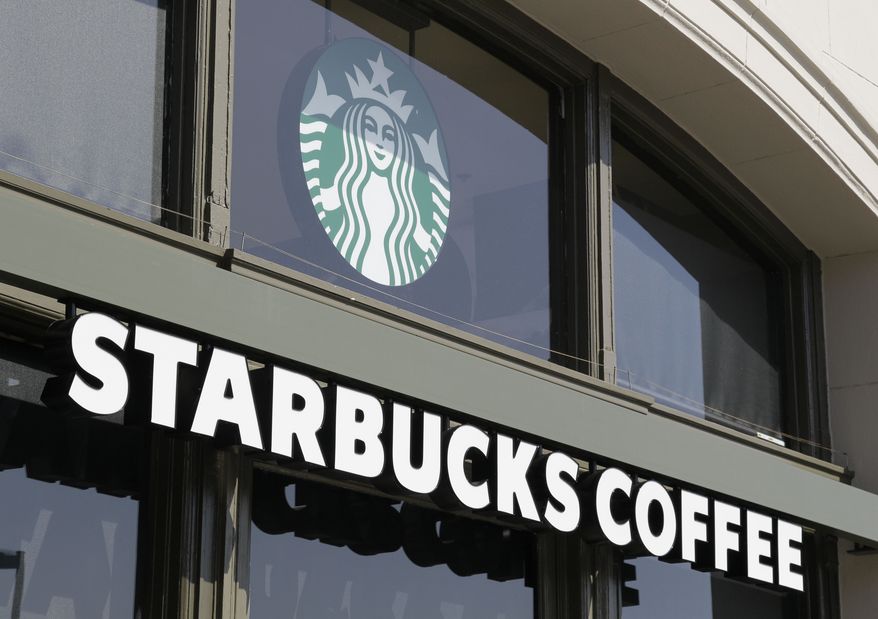 File - This April 6, 2012 file photo shows a Starbucks store on the Embarcadero in San Francisco. Starbucks and other employers in California must pay workers for minutes they routinely spend off the clock on tasks such as locking up or setting the store alarm, the state Supreme Court ruled Thursday, July 26, 2018. The unanimous ruling was a big victory for hourly workers in California and could prompt additional lawsuits against employers in the state. (AP Photo/Eric Risberg, File)
