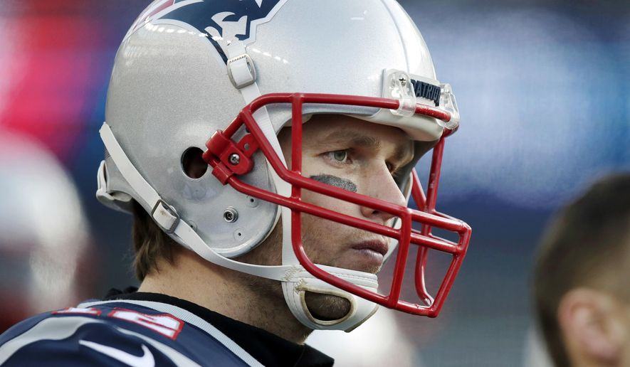 FILE - In this Jan. 21, 2018, file photo, New England Patriots quarterback Tom Brady watches from sideline during the first half of the AFC championship NFL football game against the Jacksonville Jaguars in Foxborough, Mass. Can Tom Brady win at age 41? To think he suddenly will go over the hill with the way he trains and his smarts and competitive fire is foolhardy. (AP Photo/Charles Krupa, File)