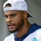 Dallas Cowboys quarterback Dak Prescott takes questions from the media after the morning walk through practice during NFL training camp, Friday, July 27, 2018, in Oxnard, Calif. (AP Photo/Gus Ruelas)