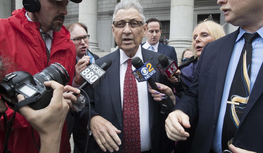 Former New York Assembly Speaker Sheldon Silver, center, is surrounded by reporters as he leaves federal court in New York after his sentencing, Friday, July 27, 2018. Silver, a former New York Assembly speaker who brokered legislative deals for two decades before criminal charges abruptly ended his career, was sentenced Friday to seven years in prison by a judge who said political corruption in the state &amp;quot;has to stop.&amp;quot; (AP Photo/Mary Altaffer)
