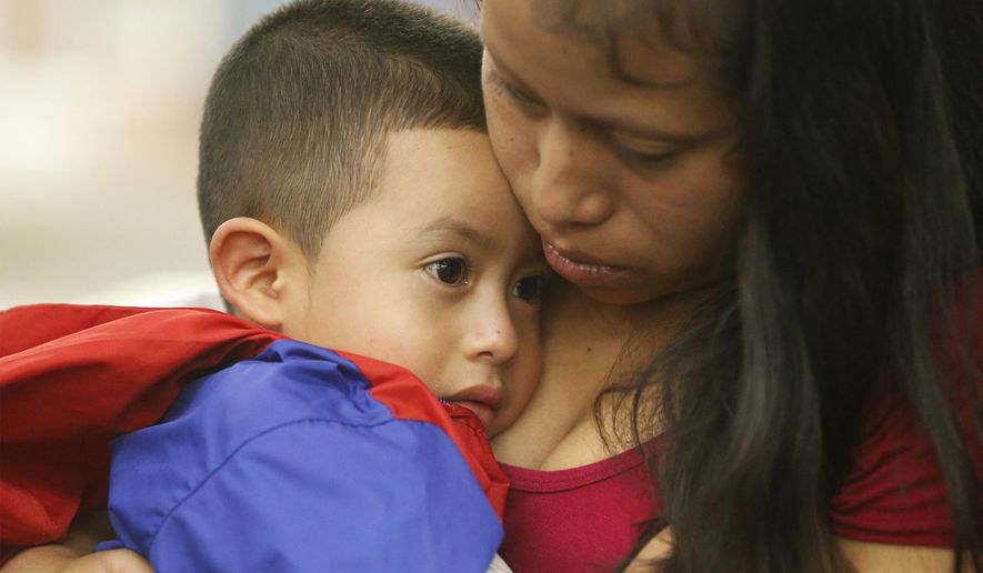 Maria holds her 4-year-old son Franco after he arrived at the El Paso International Airport Thursday, July 26, 2018 in El Paso, Texas. The two had been separated for over six weeks after being entering the country. (Ruben R. Ramirez/The El Paso Times via AP)