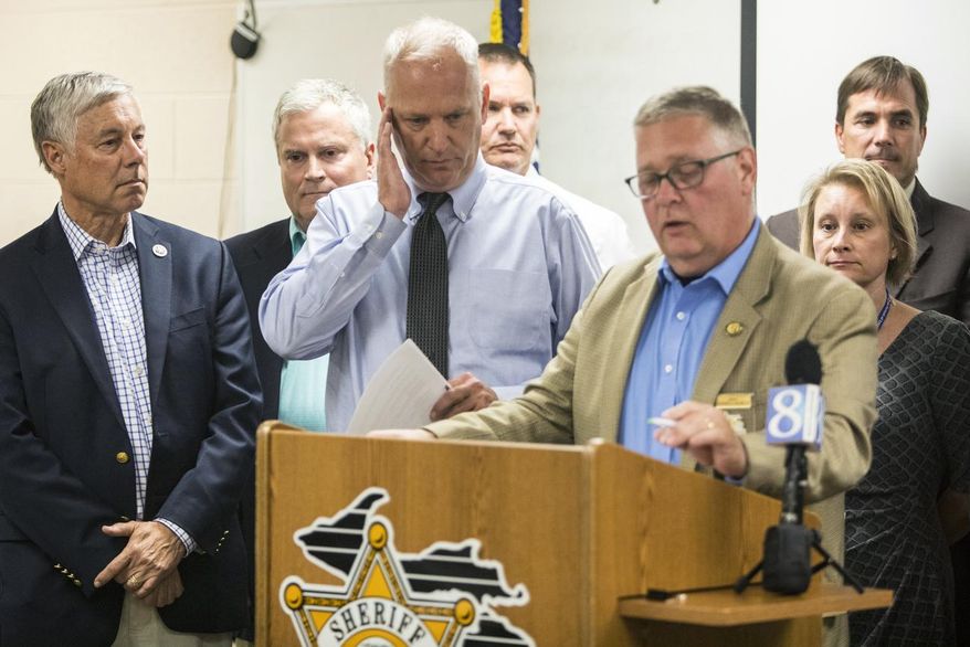Kalamazoo County Sheriff Richard Fuller speaks during a press conference about the high levels of Perfluoroalkyl and polyfluoroalkyl substances, PFAS, found in the drinking water of Parchment and Cooper Township at the Emergency Management Office inside the Kalamazoo County Sheriff Department in Kalamazoo, Michigan on Thursday, July 26, 2018. (Daniel Vasta /Kalamazoo Gazette via AP)