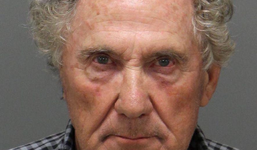 This undated photo courtesy of Wake City/County Bureau of Identification shows Charles Michael Hager, who was charged with assault with a deadly weapon and damaging property after authorities say he drove his car through a glass storefront at a Verizon Wireless store, Thursday, July 26, 2018 in Raleigh, N.C. A 911 caller says that Hager was complaining that his phone needed to be fixed and demanding that the store reopen. (Wake City/County Bureau of Identification via AP)