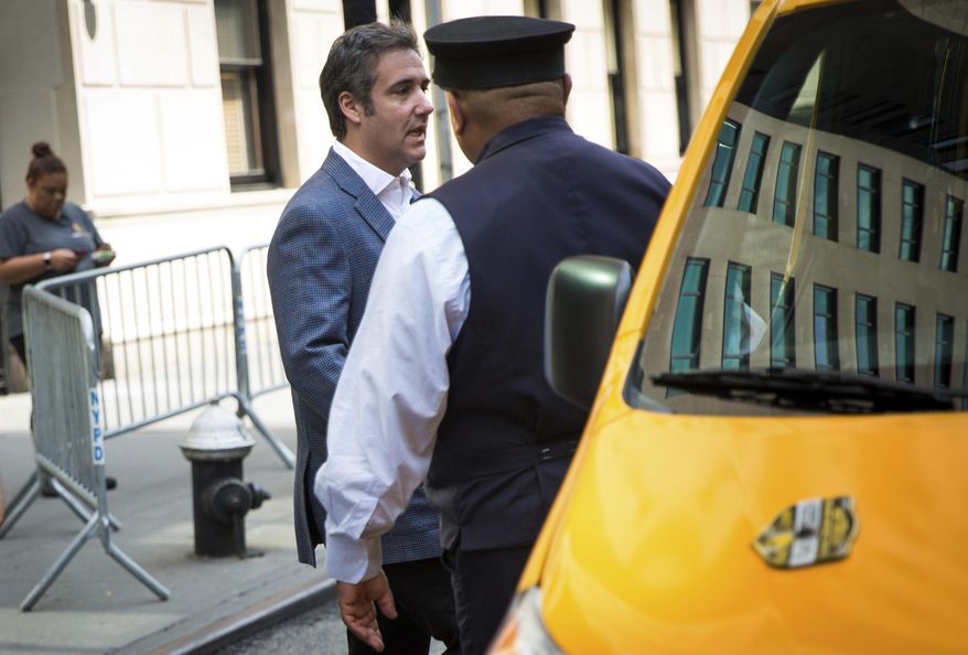 Michael Cohen, formerly a lawyer for President Trump, leaves his hotel Thursday, July 27, 2018, in New York. Cohen, claims Trump knew in advance about a Trump Tower meeting in June 2016 between a Russian lawyer, Trump's eldest son and aides. (AP Photo/Kevin Hagen)