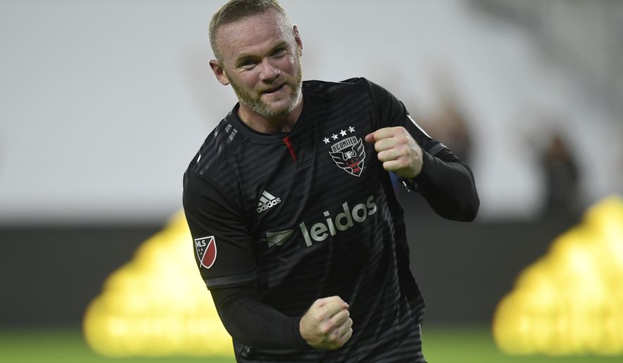 D.C. United forward Wayne Rooney celebrates his first MLS goal during the first half of a soccer match against the Colorado Rapids in Washington, Saturday, July 28, 2018. (AP Photo/Susan Walsh) ** FILE **