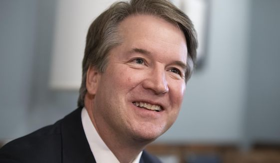 In this July 18, 2018, file photo, Supreme Court nominee Judge Brett Kavanaugh smiles during a meeting with Sen. Mike Lee, R-Utah, on Capitol Hill in Washington. Kavanaugh says he recognizes that gun, drug and gang violence &amp;quot;has plagued all of us.&amp;quot; Still, he believes the Constitution limits how far government can go to restrict gun use to prevent violent crime (AP Photo/J. Scott Applewhite, File)