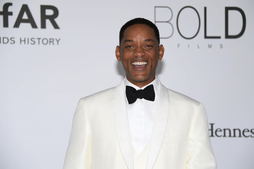 In this May 25, 2017 file photo, actor Will Smith poses for photographers upon arrival at the amfAR charity gala during the Cannes 70th international film festival, in Cap d'Antibes, southern France. Smith, Jordan Peele, Kirsten Dunst and Robert Downey Jr. are part of YouTube Original’s new series line-up. YouTube said Friday, July 27, 2018, that in “Will Smith: The Jump,” the star will bungee jump from a helicopter over the Grand Canyon. (Photo by Arthur Mola/Invision/AP, File)