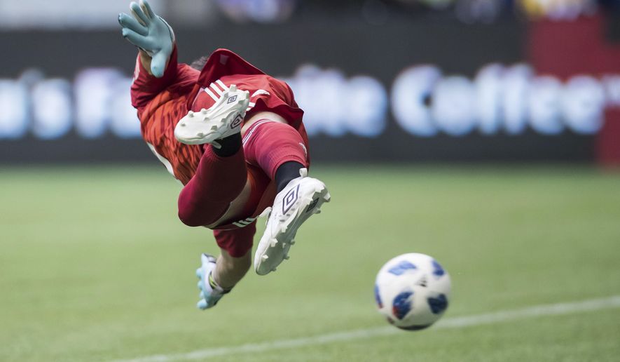 Minnesota United goalkeeper Bobby Shuttleworth allows a goal to Vancouver Whitecaps' Yordy Reyna during the first half of an MLS soccer match Saturday, July 28, 2018, in Vancouver, British Columbia. (Darryl Dyck/The Canadian Press via AP)