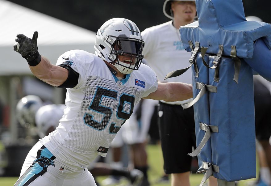 Carolina Panthers' Luke Kuechly (59) runs a drill during an NFL football practice at the team's training camp in Spartanburg, S.C., Sunday, July 29, 2018. (AP Photo/Chuck Burton)