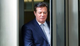 Paul Manafort leaves the federal courthouse in Washington. The trial of President Donald Trump’s former campaign chairman will open this week with tales of lavish spending on properties and clothing and allegations that the political consultant laundered money through offshore bank accounts. What’s likely to be missing: answers about whether the Trump campaign colluded with Russia during the 2016 presidential election.  (AP Photo/Pablo Martinez Monsivais, File)