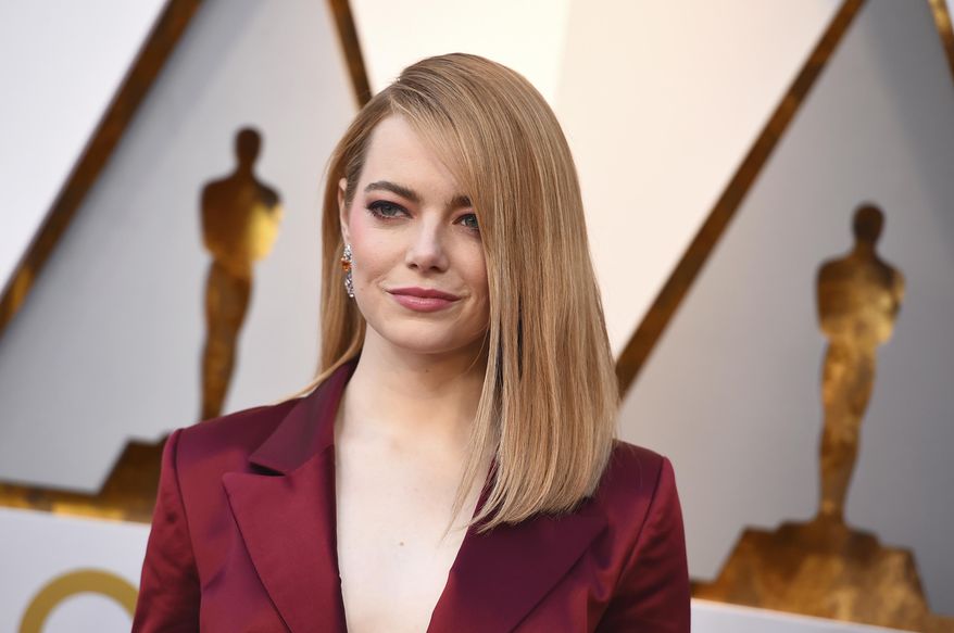 FILE - In this March 4, 2018, file photo, Emma Stone arrives at the Oscars in Los Angeles. Emma Stone plays Annie Landsberg and Jonah Hill plays Owen Milgrim in "Maniac," about a radical kind of pharmaceutical treatment with no complications or side-effects whatsoever. Things do not go as planned. (Photo by Jordan Strauss/Invision/AP, File)