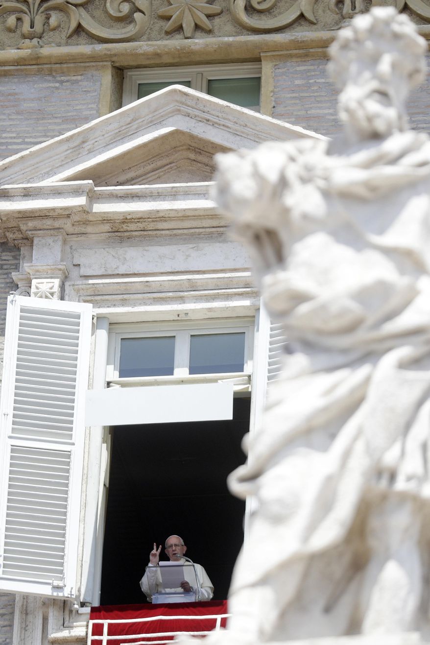 Pope Francis delivers his message from his studio window overlooking St. Peter's Square during the Angelus noon prayer at the Vatican, Sunday, July 29, 2018. (AP Photo/Gregorio Borgia)