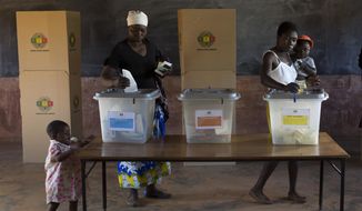 Zimbabweans vote at the Sherwood Primary School in Kwekwe, Zimbabwe, Monday, July 30, 2018. The vote will be a first for the southern African nation following a military takeover and the ousting of former long-term leader Robert Mugabe. (AP Photo/Jerome Delay)
