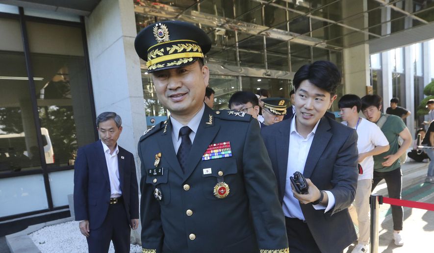 South Korean Maj. Gen. Kim Do-gyun leaves for the border village of Panmunjom to attend a joint meeting between North and South Korea to discuss how to ease military confrontations, at the Office of the South Korea-North Korea Dialogue in Seoul, South Korea, Tuesday, July 31, 2018. (AP Photo/Ahn Young-joon)