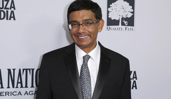 Writer, executive producer and co-director Dinesh D&#x27;Souza arrives at the LA Premiere of &quot;Death of a Nation&quot; at the Regal Cinemas at L.A. Live on Tuesday, July 31, 2018, in Los Angeles. (Photo by Willy Sanjuan/Invision/AP)