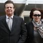 In this March 8, 2018, file photo, Paul Manafort, left, President Donald Trump&#39;s former campaign chairman, walks with this wife Kathleen Manafort, as they arrive at the Alexandria Federal Courthouse in Alexandria, Va. Jury selection is set to begin in the trial of President Donald Trumps former campaign chairman. (AP Photo/Jacquelyn Martin, File)