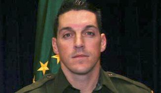 This undated photo provided by U.S. Customs and Border Protection shows U.S. Border Patrol agent Brian A. Terry. Terry was killed in a 2010 firefight near the Arizona-Mexico border between U.S. agents and five men who had sneaked into the country to rob marijuana smugglers. On Monday Nov. 18, 2013 a judge dismissed federal employees from a wrongful death lawsuit filed by the family of the slain Border Patrol agent over the botched &quot;Fast and Furious&quot; gun operation. (AP Photo/U.S. Customs and Border Protection, File)
