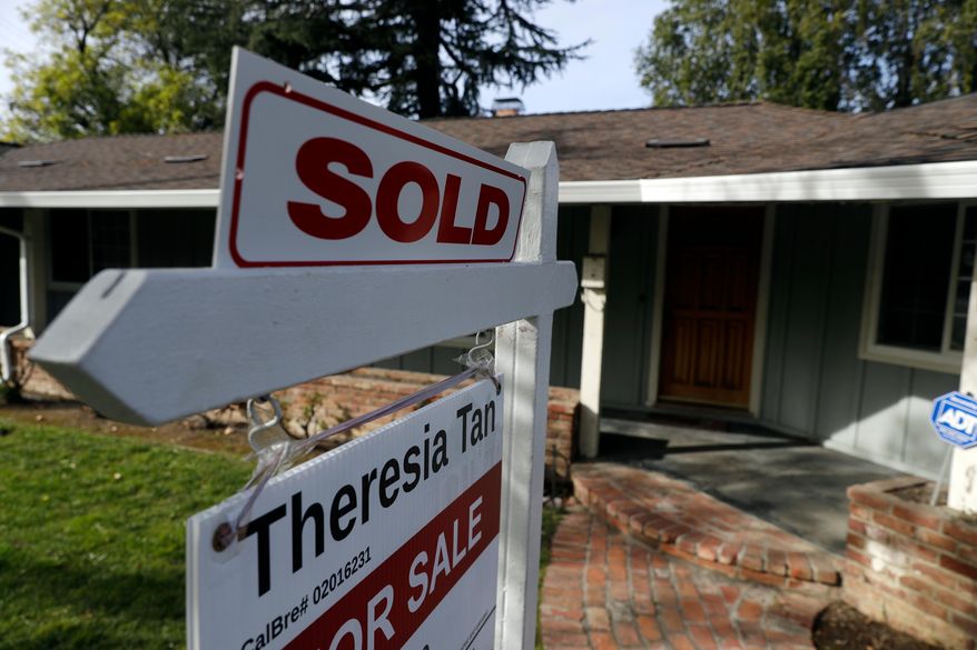 FILE - In this March 6, 2018, photo a home is advertised as sold in Sunnyvale, Calif. U.S home prices rose rapidly in May 2018, a trend that is thwarting some would-be buyers and pulling down home sales. The S&P CoreLogic Case-Shiller 20-city home price index rose 6.5 percent in May from a year earlier. .(AP Photo/Marcio Jose Sanchez, File)