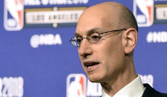 FILE - In this Feb. 17, 2018, file photo, NBA commissioner Adam Silver speaks to the media during All-Star basketball festivities in Los Angeles. The NBA and WNBA will now share official data with MGM Resorts International, a major win for the leagues as they prepare for the anticipated growth of sports betting across the country. The Las Vegas-based casino giant will pay the NBA for that data to use in determining outcomes of various bets. Terms of the deal announced Tuesday, July 31, 2018, were not disclosed, other than it’s a multiyear arrangement. (AP Photo/Chris Pizzello, File) **FILE**