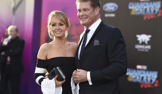 FILE - In this April 19, 2017 file photo, Hayley Roberts, left, and David Hasselhoff arrive at the world premiere of &amp;quot;Guardians of the Galaxy Vol. 2&amp;quot; in Los Angeles. Hasselhoff’s publicist confirmed Tuesday, July 31, that the actor has married model Hayley Roberts. The small ceremony between the 66-year-old “Baywatch” star and 38-year-old Roberts took place in Italy with close friends and family. The couple first met seven years ago when Hasselhoff was a judge on &amp;quot;Britain&#39;s Got Talent.&amp;quot; He was filming auditions at a hotel and Roberts approached him for an autograph. He said he&#39;d only give it to her if she gave him her phone number. (Photo by Jordan Strauss/Invision/AP, File)