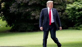 President Donald Trump walks across the South Lawn before boarding Marine One at the White House in Washington, Tuesday, July 31, 2018, for a short trip to Andrews Air Force Base, Md., and then on to Tampa, Fla. where he will speak at a rally. (AP Photo/Andrew Harnik)