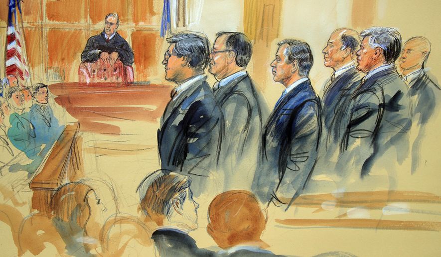 This courtroom sketch depicts Paul Manafort, fourth from right, standing with his lawyers in front of U.S. district Judge T.S. Ellis III, center rear, and the selected jury, seated left, during the jury selection of his trial at the Alexandria Federal Courthouse in Alexandria, Va., Tuesday, July 31, 2018. A jury set to decide the fate of President Donald Trump&#39;s former campaign chairman Manafort was selected Tuesday, and opening statements in his tax evasion and bank fraud trial were expected in the afternoon. (Dana Verkouteren via AP)