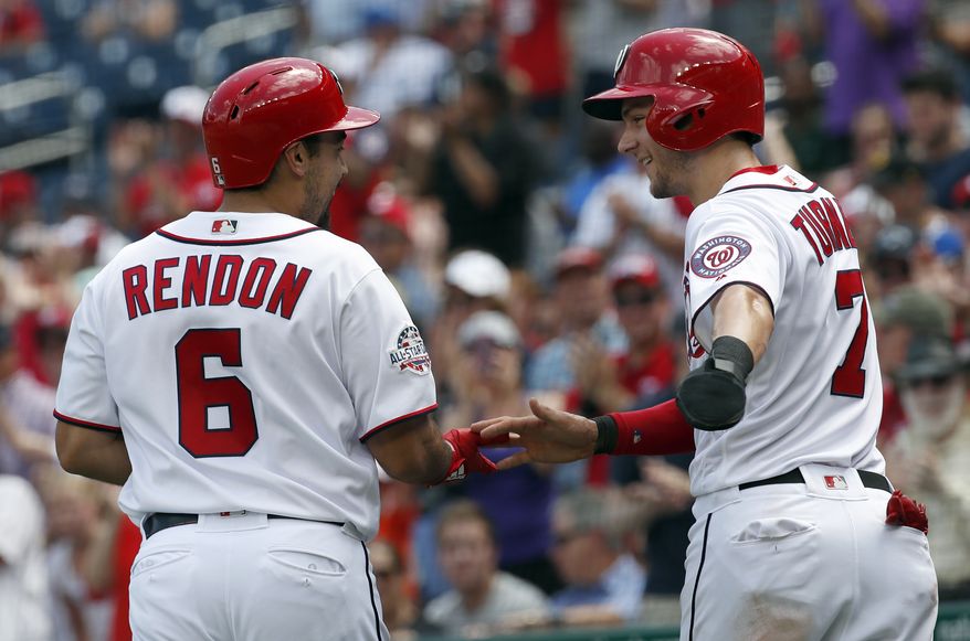 Washington Nationals&#39; Anthony Rendon (6) celebrates his two-run home run with Trea Turner (7) during the third inning of a baseball game against the New York Mets at Nationals Park, Wednesday, Aug. 1, 2018, in Washington. (AP Photo/Alex Brandon)
