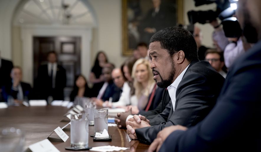 Pastor Darrell Scott speaks during a meeting with President Donald Trump and inner-city pastors in the Cabinet Room of the White House in Washington, Wednesday, Aug. 1, 2018. (AP Photo/Andrew Harnik)