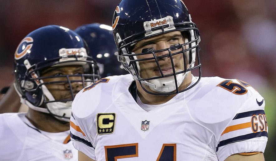 In this Nov. 19, 2012, file photo, Chicago Bears middle linebacker Brian Urlacher (54) warms up before an NFL football game against the San Francisco 49ers in San Francisco. Urlacher will be inducted into the Hall of Fame on on Saturday, Aug. 4, 2018. (AP Photo/Marcio Jose Sanchez, File)