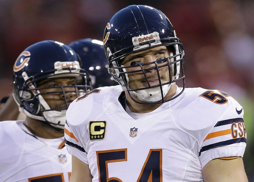 In this Nov. 19, 2012, file photo, Chicago Bears middle linebacker Brian Urlacher (54) warms up before an NFL football game against the San Francisco 49ers in San Francisco. Urlacher will be inducted into the Hall of Fame on on Saturday, Aug. 4, 2018. (AP Photo/Marcio Jose Sanchez, File)