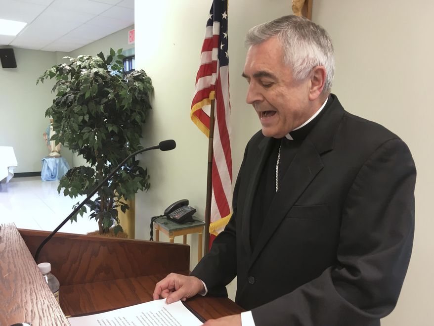 The Most Rev. Ronald Gainer, the Roman Catholic bishop of the diocese of Harrisburg, Pa., discusses child sexual abuse by clergy and a decision by the diocese to remove names of bishops going back to the 1940s after concluding they did not respond adequately to abuse allegations, Wednesday, Aug. 1, 2018 during a news conference in Harrisburg, Pa. The bishop apologized to victims and said the diocese is posting an online list of 71 priests and others in the church accused of the abuse. Following the Erie, Pa., diocese, the Harrisburg diocese is the second Pennsylvania diocese to get ahead of a roughly 900-page grand jury report that could be made public in August 2018, which the Pennsylvania Supreme Court said found more than 300 "predator priests" in six of the state's eight dioceses. (AP Photo/Mark Scolforo)