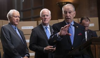 Senate Judiciary Chairman Chuck Grassley, R-Iowa, joined from left by Sen. Orrin Hatch, R-Utah, Sen. John Cornyn, R-Texas, and Sen. Mike Lee, R-Utah, holds a news conference to refute Senate Democrats who are intensifying their fight over documents related to Supreme Court nominee Brett Kavanaugh&#39;s stint as staff secretary at the White House, on Capitol Hill in Washington, Thursday, Aug. 2, 2018. (AP Photo/J. Scott Applewhite)