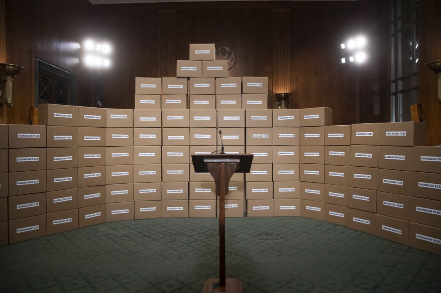 A wall of empty cardboard boxes labeled "Kavanaugh Files" was erected as a backdrop for a news conference by Republican members of the Senate Judiciary Committee last week. The boxes are supposed to represent the large number of documents Senate Democrats have requested to review Supreme Court nominee Brett M. Kavanaugh's record. (Associated Press/File)